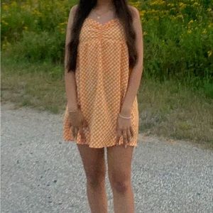 Orange flowy mini dress